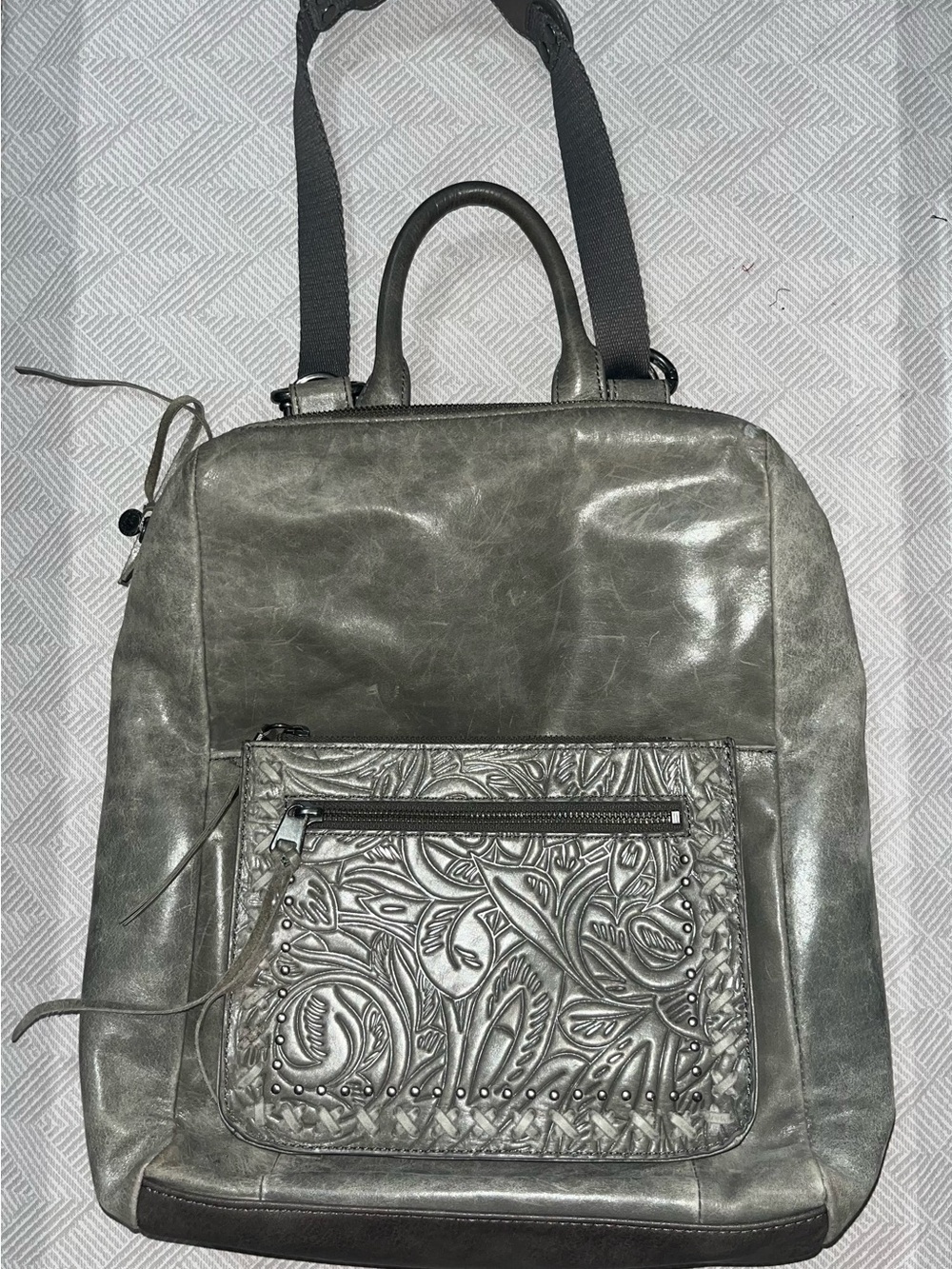 The Sak Metallic Gray Embossed Leather Backpack